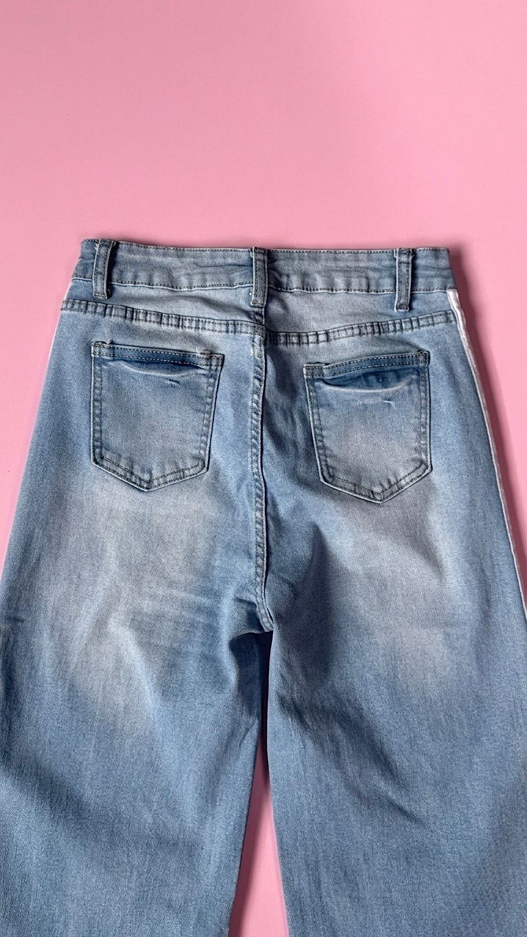 Pantalon pierna ancha azul con líneas laterales color blanco Surprise jeans - 5998