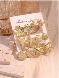 Set de 12 pz de pendientes dorados marinos & flor - 6108