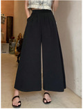 Pantalon negro pierna ancha elástico en cintura bolsillos plisados - 6110