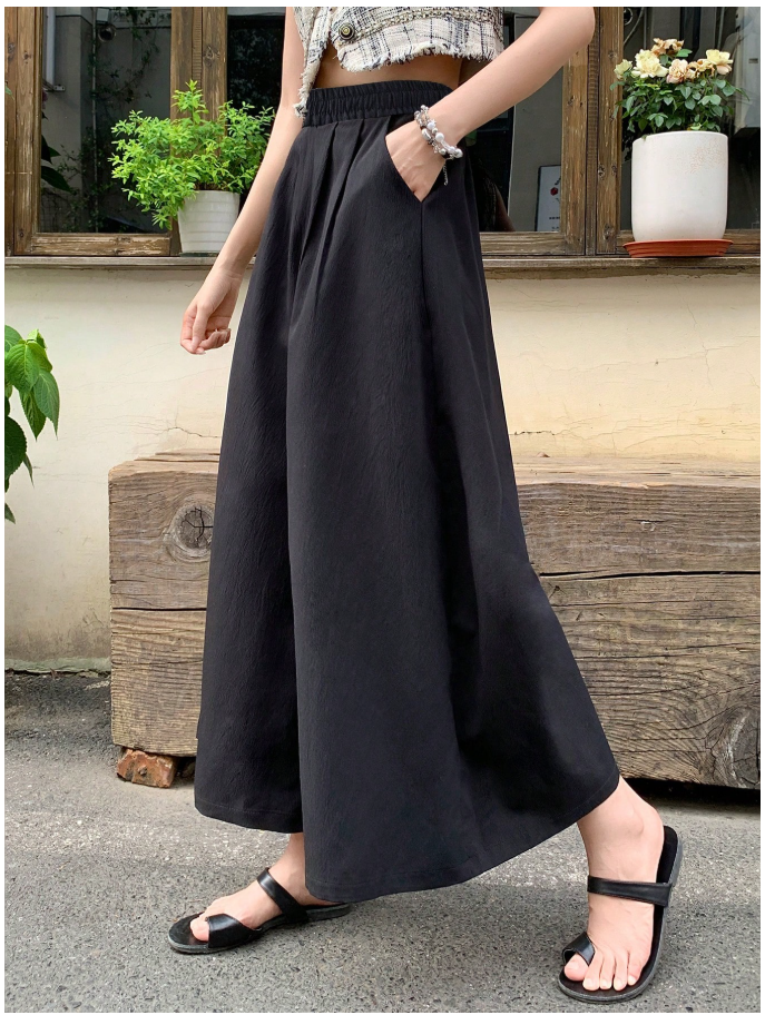 Pantalon negro pierna ancha elástico en cintura bolsillos plisados - 6110
