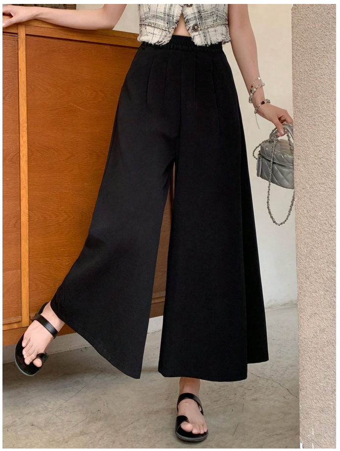 Pantalon negro pierna ancha elástico en cintura bolsillos plisados - 6110