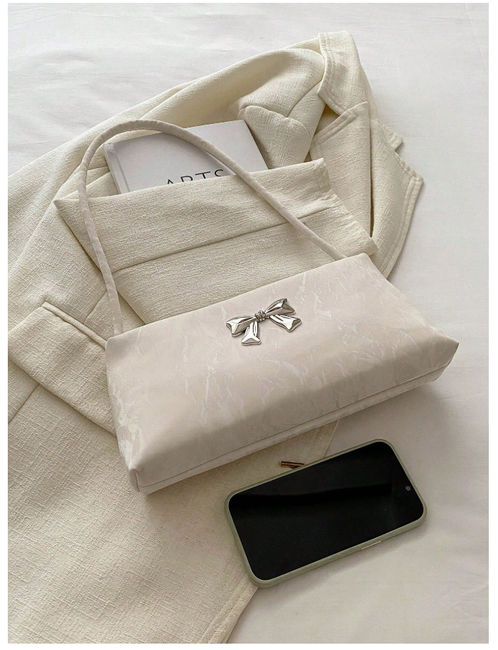 Cartera blanca con decoración de lazo metálico - 6164
