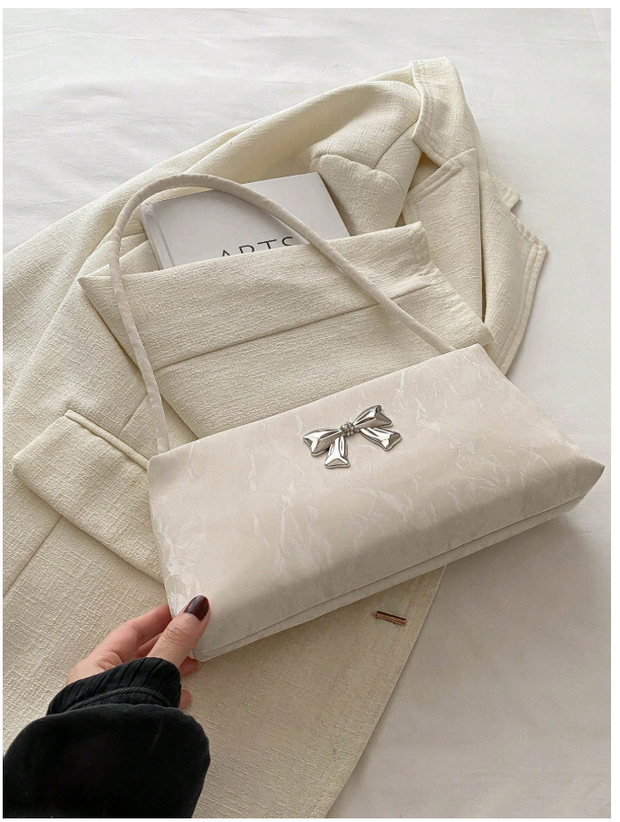 Cartera blanca con decoración de lazo metálico - 6164