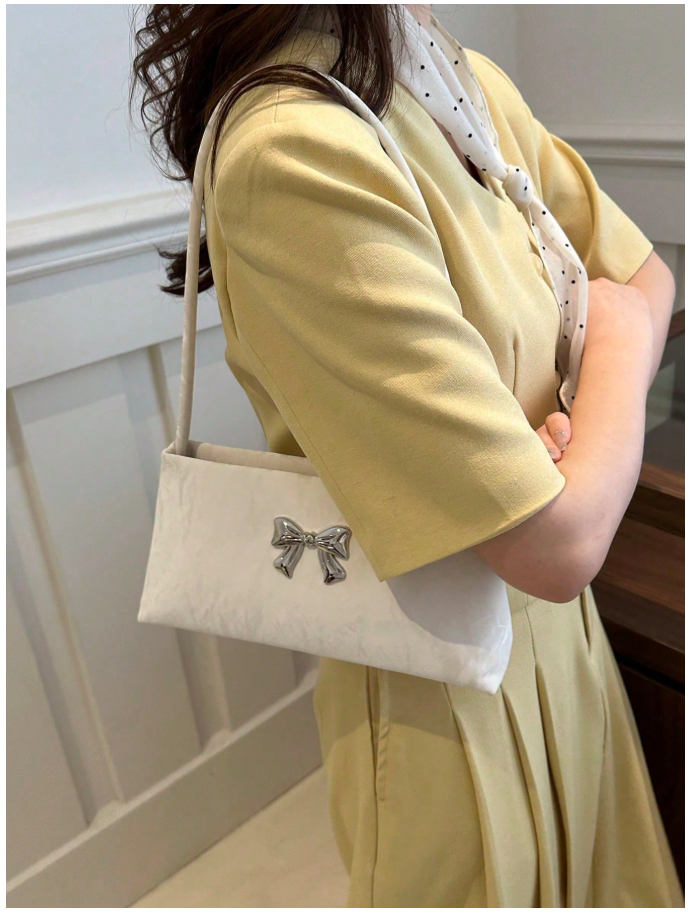 Cartera blanca con decoración de lazo metálico - 6164