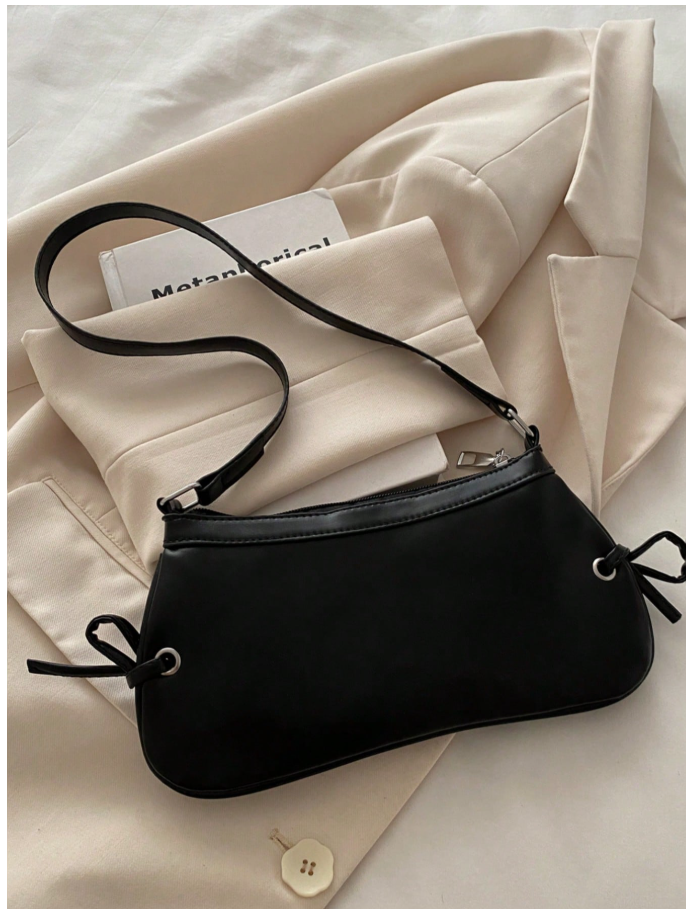 Cartera negra de cuerina con lazos - 6179