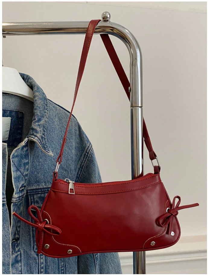 Cartera burdeos de cuerina con lazos - 6180
