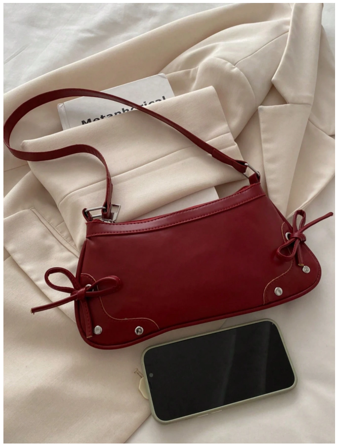 Cartera burdeos de cuerina con lazos - 6180