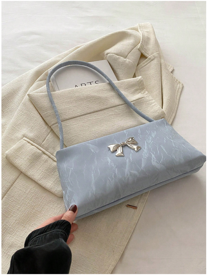 Cartera azul con decoración de lazo metálico - 6181