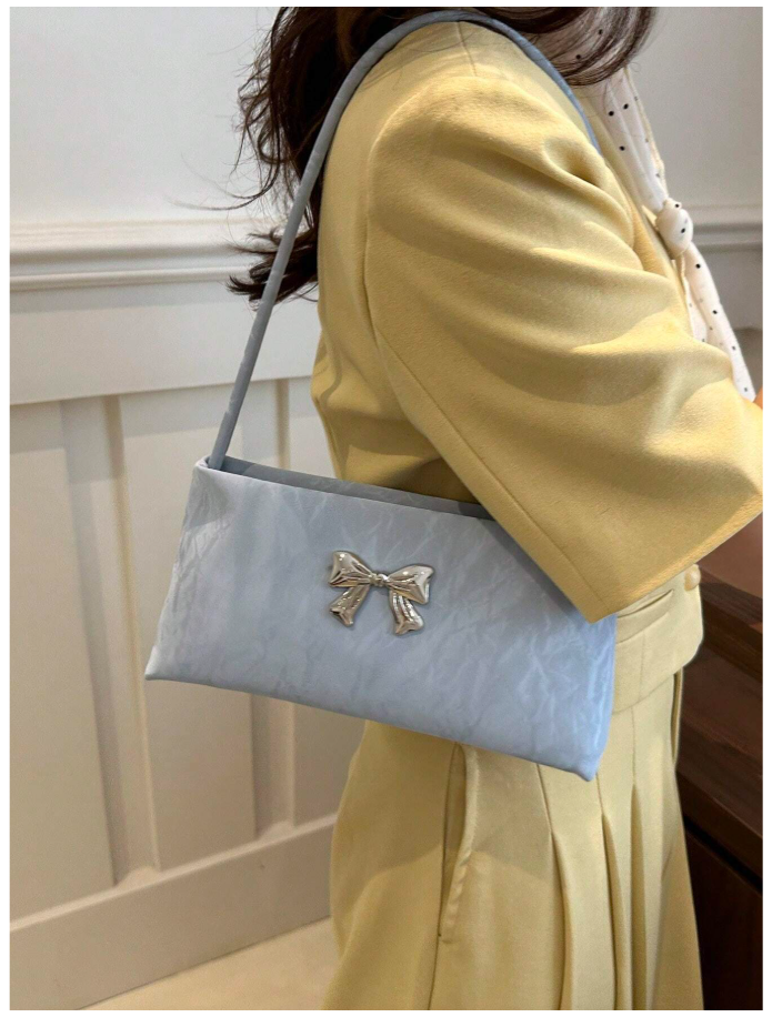 Cartera azul con decoración de lazo metálico - 6181