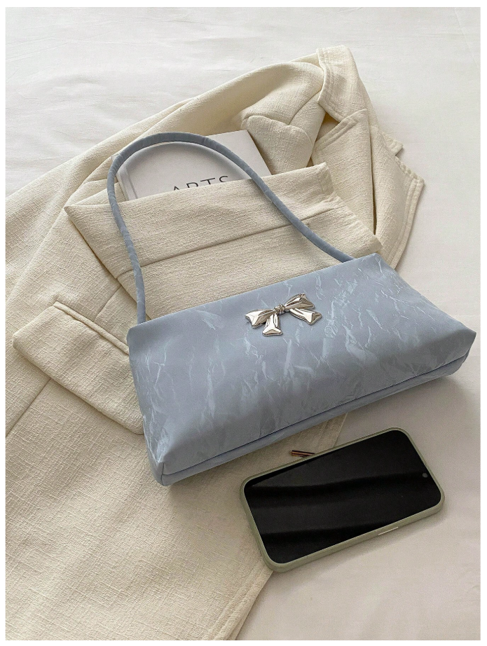 Cartera azul con decoración de lazo metálico - 6181
